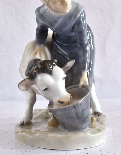 Royal Copenhagen Milkmaid Feeding Cow Figure