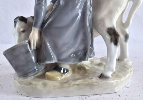 Royal Copenhagen Milkmaid Feeding Cow Figure
