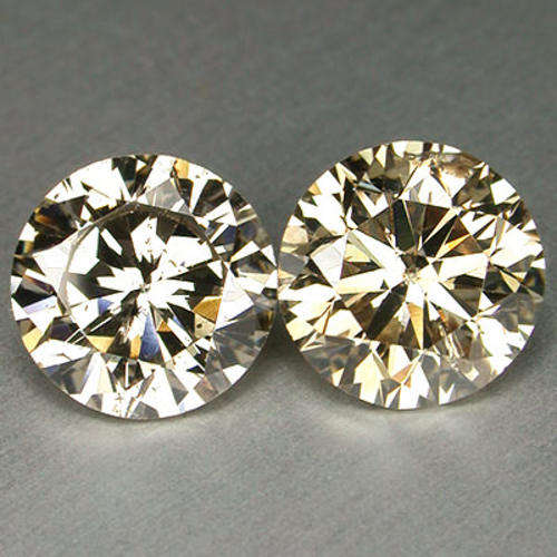 SMALL BUT BEAUTIFUL PAIR OF .22 tcw CHAMPAGNE VS DIAMONDS @ R1 START !!!