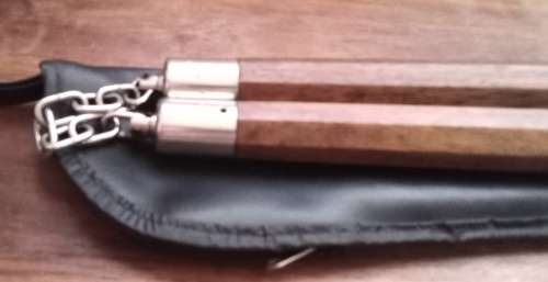 Nunchakus in zipper pouch. Lenght 30 cm.