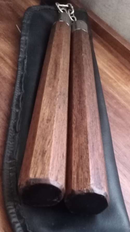 Nunchakus in zipper pouch. Lenght 30 cm.