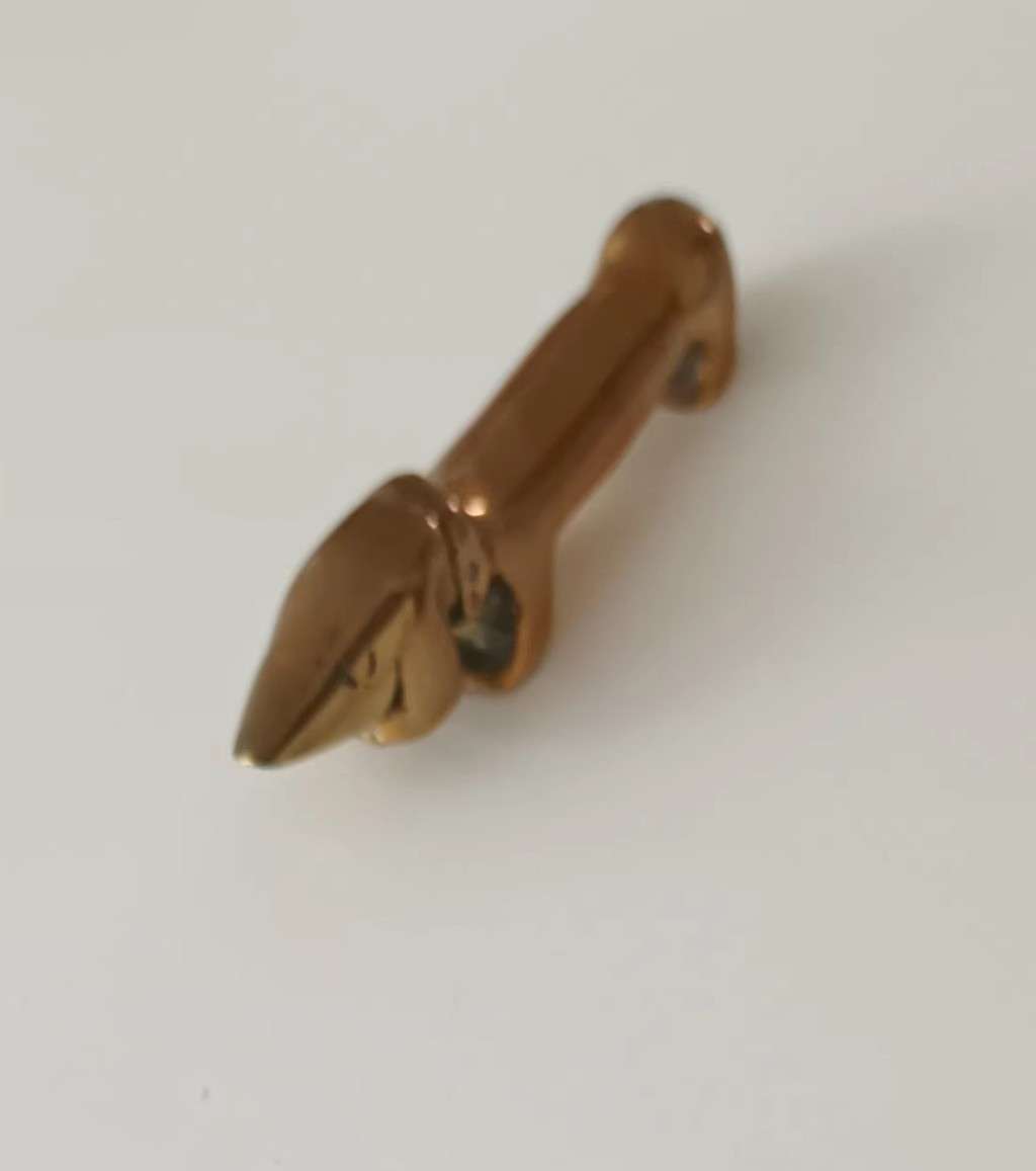 Brass. Dachshund. Length 10.5cm. Height 2cm.