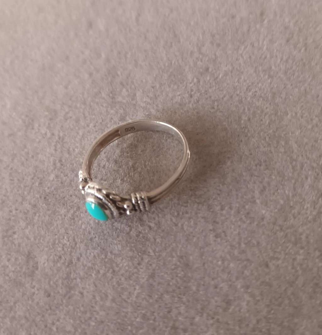 Sterling Silver Ring with Turquoise Stone. 2g. Size K.