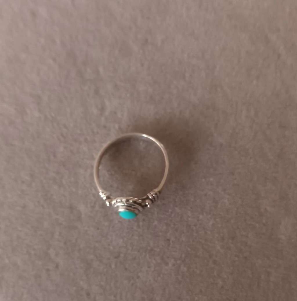 Sterling Silver Ring with Turquoise Stone. 2g. Size K.