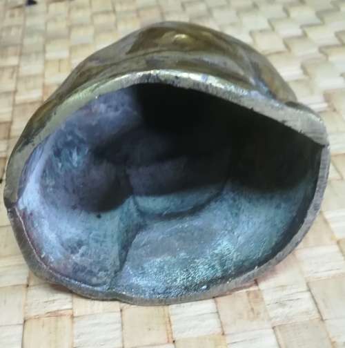 Brass Budha ornament.