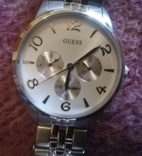 Guess Ladies Watch Stainless Steel Thin Mint.