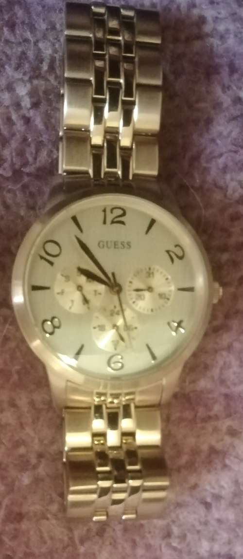 Ladies Guess Watch. Goldtone Stainless Steel .