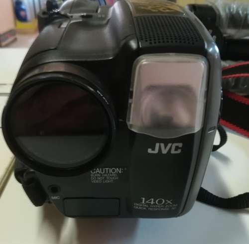JVC VIDEO CAMERA MODEL GR - AX860. COMES WITH TRIPOD AND CARRY CASE & REMOTE CONTROL.