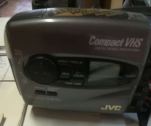 JVC VIDEO CAMERA MODEL GR - AX860. COMES WITH TRIPOD AND CARRY CASE & REMOTE CONTROL.