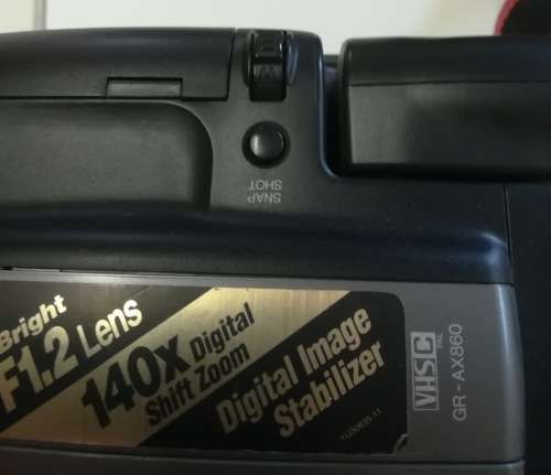 JVC VIDEO CAMERA MODEL GR - AX860. COMES WITH TRIPOD AND CARRY CASE & REMOTE CONTROL.