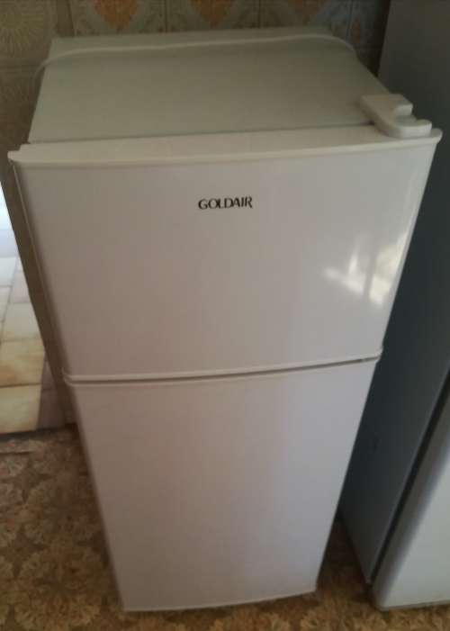 GOLDAIR 130liter doubledoor refrigerator. Like new. Length 102cm. Width 40cm. (NO DELIVERY)