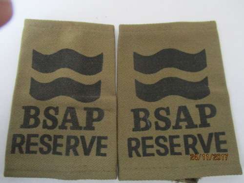 TWO PAIRS. RHODESIAN B S A P RESERVE SHOULDER SLIP ON TABS