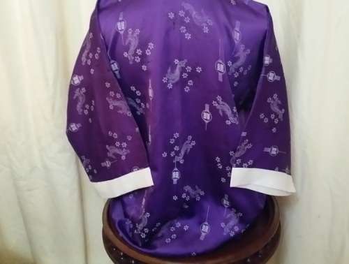 A ORIENTAL PURPLE BATH ROBE