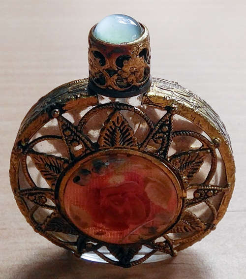Filligree perfume bottle