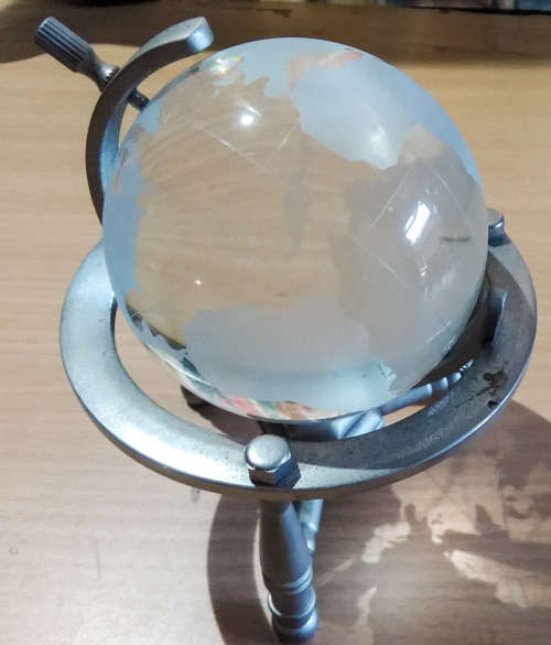 Glass world globe paperweight