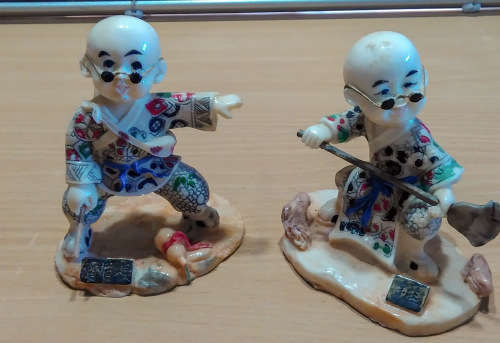 Oriental monk boy figures