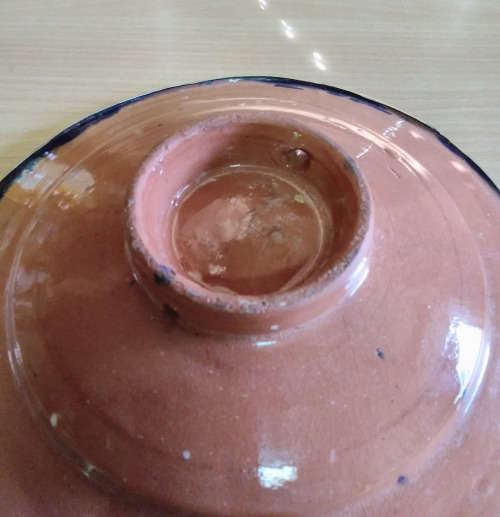 Cladded pottery dish