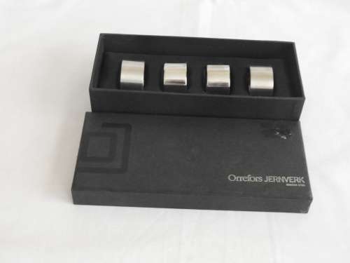 BOXED SET OF 4 ORREFORS SERVIETTE RINGS - STAINLESS STEEL