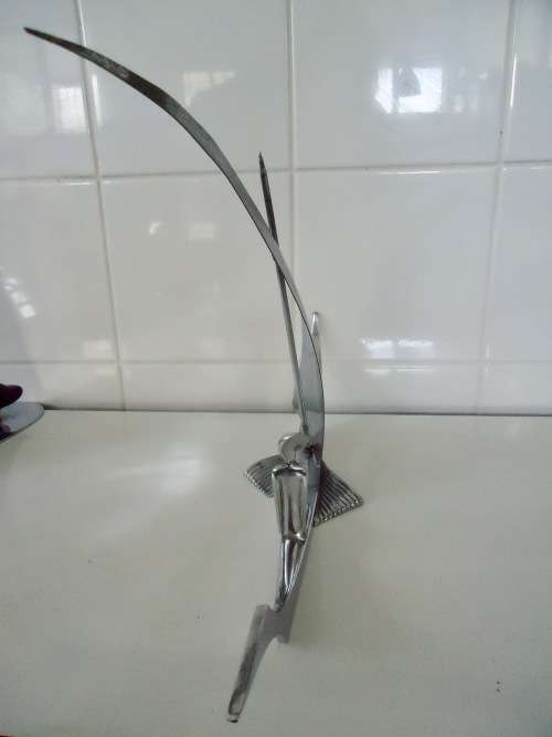 ART DECO HAGANAUER "LADY IN BOAT" METAL FIGURE - CIRCA 1930's AUSTRIA