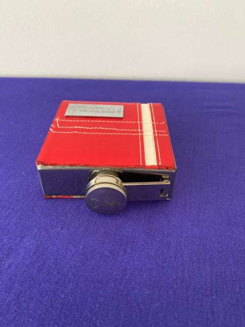 JOHNNIE WALKER LABELLED RED LEATHER CASED HIP FLASK