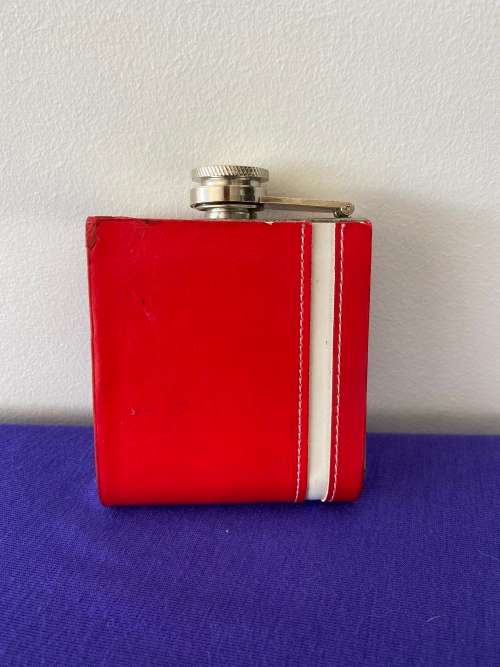 JOHNNIE WALKER LABELLED RED LEATHER CASED HIP FLASK