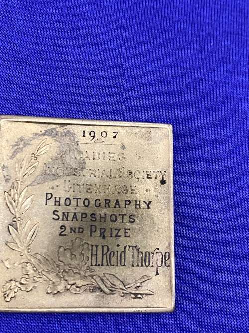 1907 BRONZED MEDAL FOR LADIES INDUSTRIAL SOCIETY UITENHAGE SIGNED J.A.R