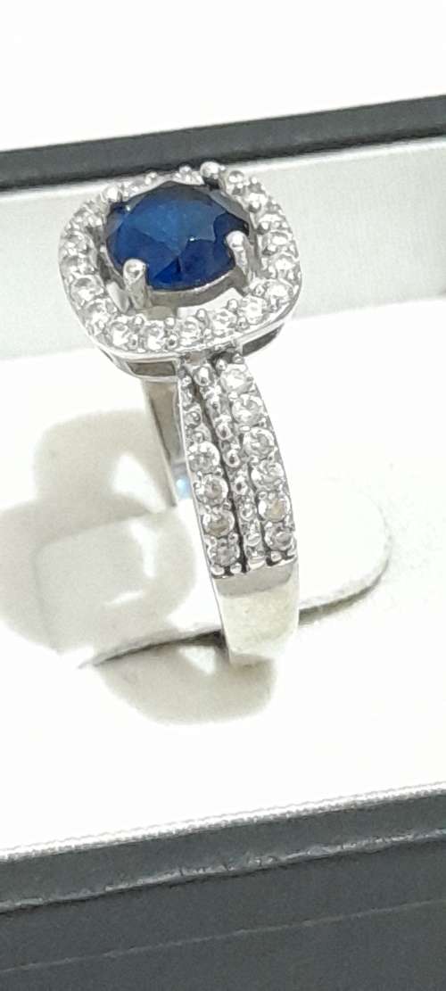 Sterling silver ring with blue stone