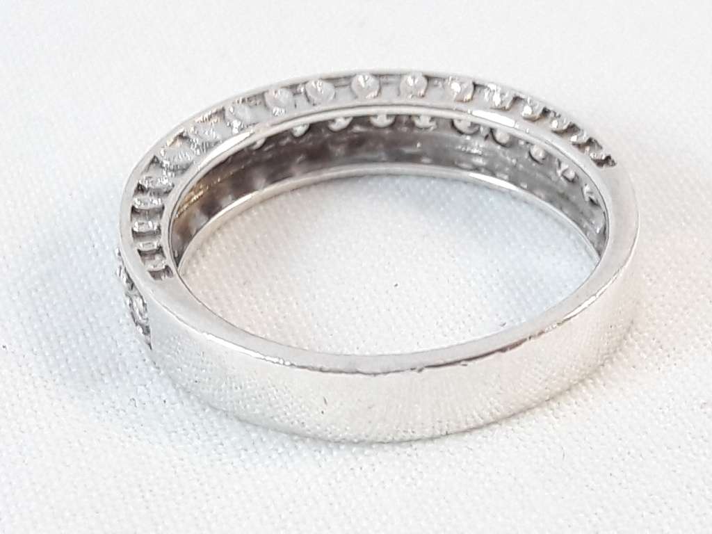 Sterling silver half eternity ring with clear zirconias