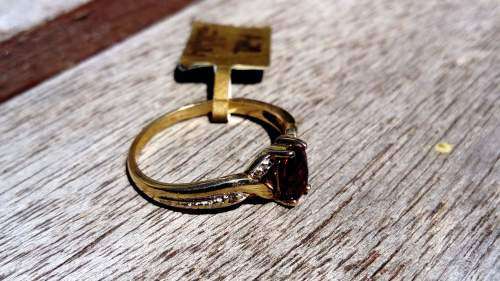 9ct Yellow Gold Crossover Garnet & Diamond Ring.