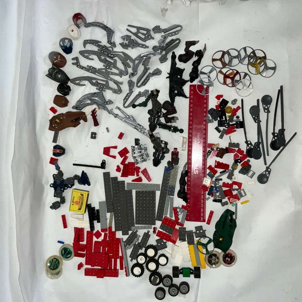 Very large odds bag of toys, toy parts, and various Lego pieces and accessories