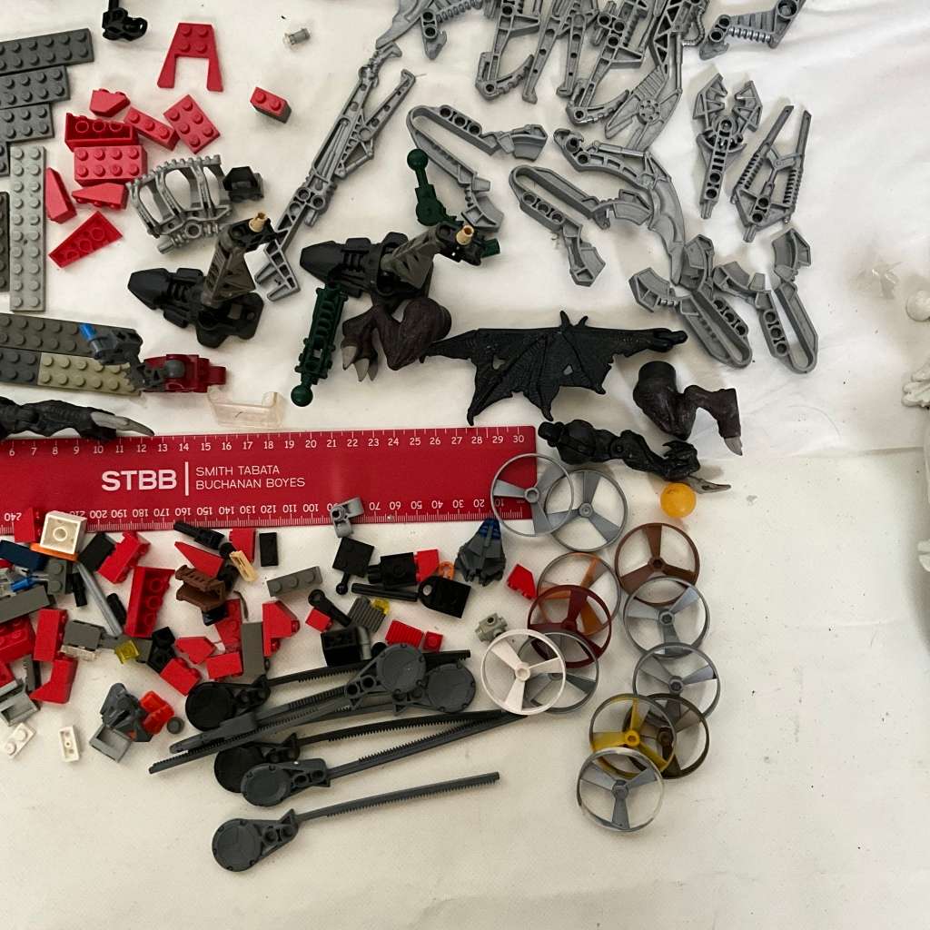 Very large odds bag of toys, toy parts, and various Lego pieces and accessories