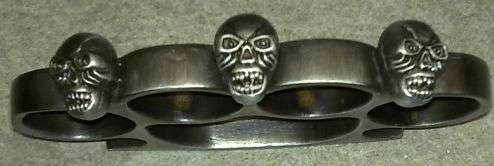 Knuckle Duster knuckle buster silver metal with skulls