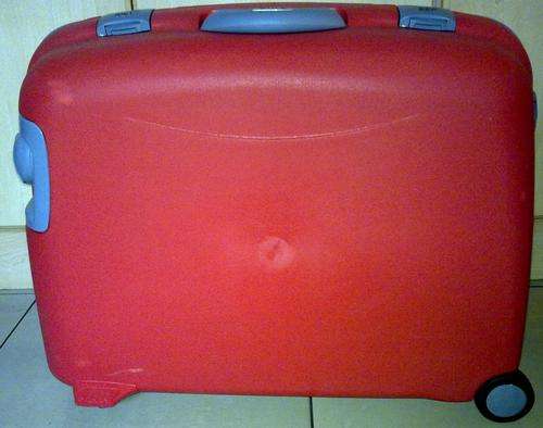 Suitcase with wheels hard plastic outer case