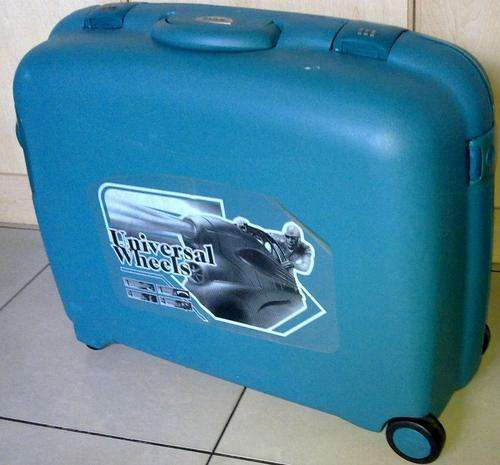 Suitcase with wheels hard plastic outer case 65cm x55cm x 25cm