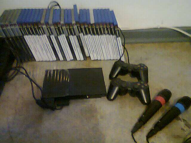 SONY PLAYSTATION 2 with 30 games + extras!!!!!