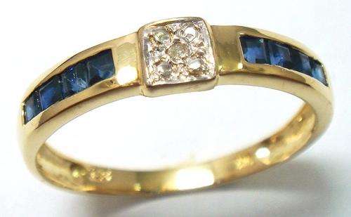 Beautiful solid 9kt gold and genuine sapphire and diamond ring.