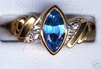Beautiful genuine 1.5ct topaz and 0.04ct diamond 10kt gold ring