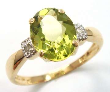 Beautiful solid 9kt gold and genuine peridot and diamond ring.