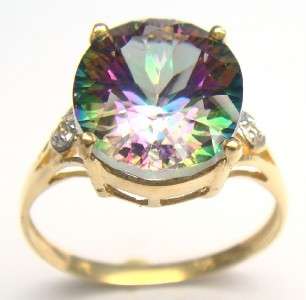 Beautiful solid 9kt gold and genuine mystic topaz and diamond ring.