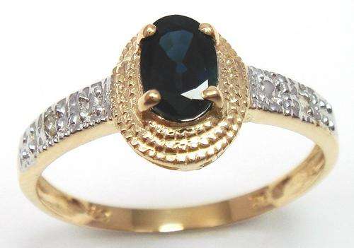 Beautiful solid 9kt gold and genuine sapphire and diamond ring.