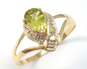 Beautiful solid 9kt gold and genuine peridot and diamond ring.