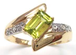 Beautiful solid 10kt gold and genuine peridot and diamond ring.