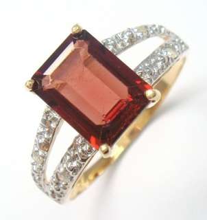 Beautiful solid 10kt gold and genuine garnet and diamonds ring.