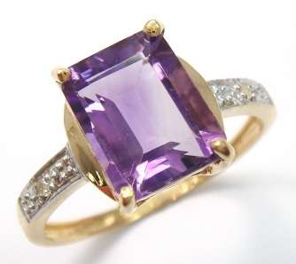 Beautiful solid 9kt gold and genuine amethyst and diamond ring.