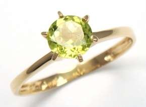 Beautiful solid 10kt gold and genuine peridot ring.