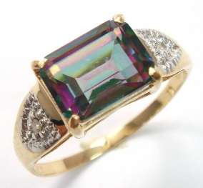 Beautiful solid 9kt gold and genuine mystic topaz and diamond ring.