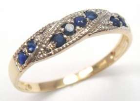 Beautiful solid 10kt gold and genuine sapphire and diamond ring.