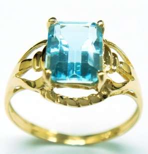 Beautiful solid 10kt gold and genuine blue topaz ring.