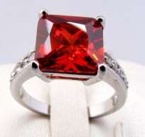 Beautiful 14kt white gold GP and simulated ruby ring.