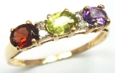 Beautiful solid 9kt gold and genuine multiple gemstones and diamonds ring.